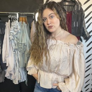 Flirting for fun off the shoulder top